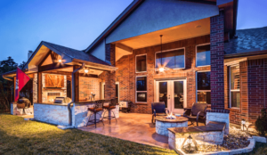 Custom Backyard Patio and Fire Pit by Creekstone Outdoor Living in Houston, Texas