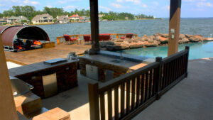 Sunken Outdoor Kitchen with a Bar next to the Pool