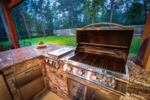 Custom Outdoor Kitchen with BLAZE Grill, Side Burner and Stainless Steel Refrigerator in Houston, Texas